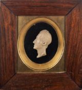 A wax profile portrait of a gentleman, Consultant Surgeon to the Manchester Royal Infirmary,