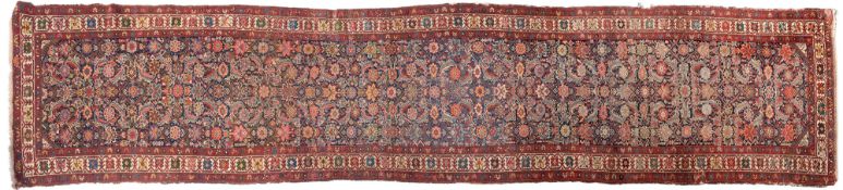 A Malayer runner, the indigo field with an all over Herati design,