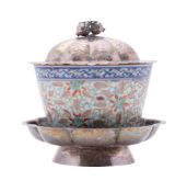 A Chinese silver-mounted porcelain 'rice grain' cup, late Qing dynasty with engraved silver stand,
