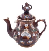 A Measham or Barge Ware pottery teapot of typical form with domed cover and teapot knop,