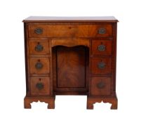 A George IV mahogany kneehole desk,