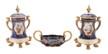 A pair of Coalport two-handled vases and covers and a similar small basket,
