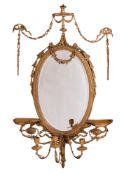 A 19th century carved giltwood and gesso oval Girandole wall mirror,