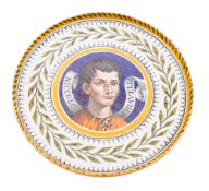 A Richard Ginori majolica stand or low tazza of circular form enamelled with a portrait of Nicolo
