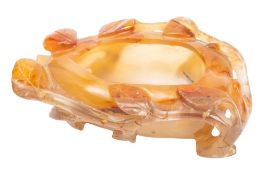 A Chinese agate lotus brush washer, late Qing/20th century carved with stems,