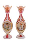 A pair of Bohemian ruby and white overlay glass vases, 19th century of slender baluster form,