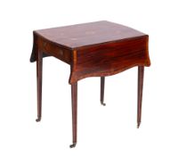 An early 19th century mahogany and inlaid Pembroke table, bordered with sycamore lines,