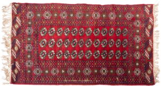 A Hamadan Rug, the shaded field with triple serated and hooked lozenge medallions,