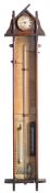 An English oak Admiral Fitzroy barometer with a Jerome & Co.