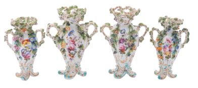 A matched pair of Coalport two-handled vases and a similar smaller pair,