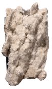 A large specimen of clustered clear quartz; of loosely rectangular form;