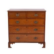 An early 19th Century oak rectangular chest, with a moulded and cross banded top,