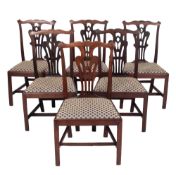 A set of six George III mahogany dining chairs,