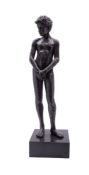 A patinated faux bronze model of a youth,