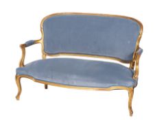 A French giltwood Canape in the Louis XV taste with a moulded frame,
