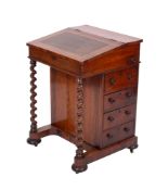 A Victorian rosewood Davenport,