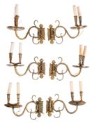 A set of six brass twin-light wall appliques in Dutch early 18th century style,