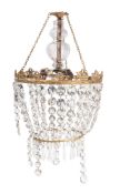 A three-light gilt metal and glass 'bag' electrolier,