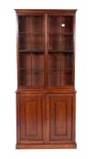 A mahogany and glazed bookcase, 19th century and later,