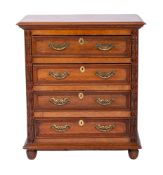 An oak rectangular chest in the Jacobean taste, the top with a moulded edge,