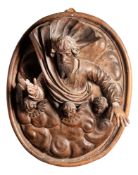 A Continental walnut relief panel, God the Father,