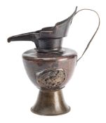 A Tibetan copper and bronze monk's cap ewer, 19th century, 24cm.