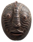 A South Pacific carved wooden mask,