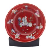 A Chinese famille rose 'Sixteen Boys' bowl, late Qing Dynasty with shaped rim,