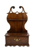 A George III walnut spoon rack,