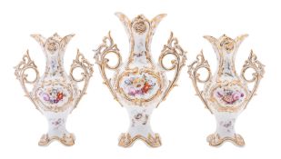 A garniture of three Coalport baluster vases, circa 1835 with vine branch handles,