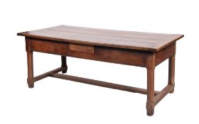 An 18th Century French Provincial oak and fruitwood farmhouse table, of refectory type,