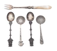Two Mexican silver spoons and a silver f
