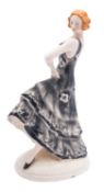 A German pottery Art Deco figure of a da