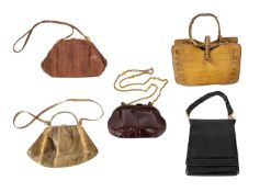 Five crocodile skin handbags. In a range