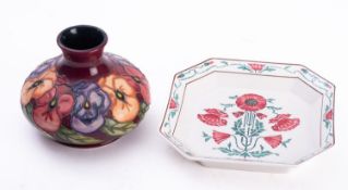 A John Moorcroft pottery vase of squat f