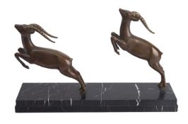 An Art Deco bronze group of two leaping