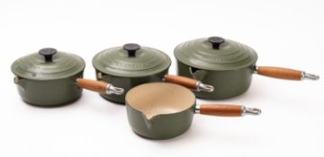 A set of four Le Cruset cast iron saucep