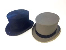Two Moss Bros, Covent Garden top hats. C