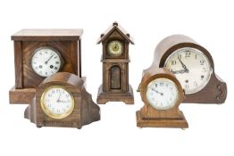 Five oak-cased mantel clocks to include