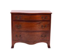 A mahogany serpentine front dwarf chest of drawers in George III style,
