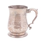 A George II silver mug, baluster form,
