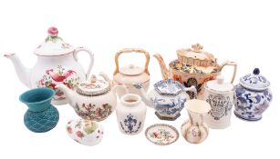 A mixed group of ceramics, primarily tea wares, but with some mustard pots, preserve jars and vases,