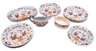 An Ironstone china part table service, decorated in a Japan pattern, [some damage].