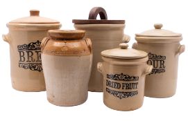 A set of five stoneware kitchen jars, including Bread, Flour, and Dried Fruit etc,