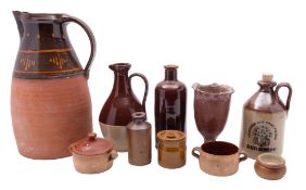 Thirteen various stoneware crocs and jugs, early 20th century; including bread and flour etc,