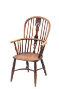 An ash, elm and oak Windsor elbow chair,