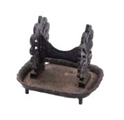 A substantial Regency of George IV cast iron boot scrape,