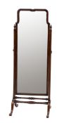 A mahogany cheval mirror in George I taste, early 20th century; basically rectangular,