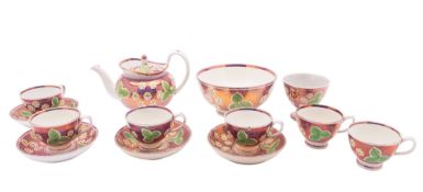 A Baudour Fuisseaux porcelain part tea service comprising a teapot, sugar box, milk jug, waste bowl,