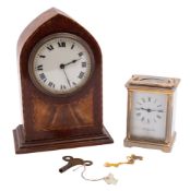 A Buren mahogany and line inlaid mantle clock.